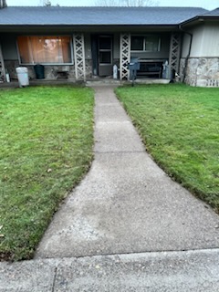 Walkway up to a house that is cleaned